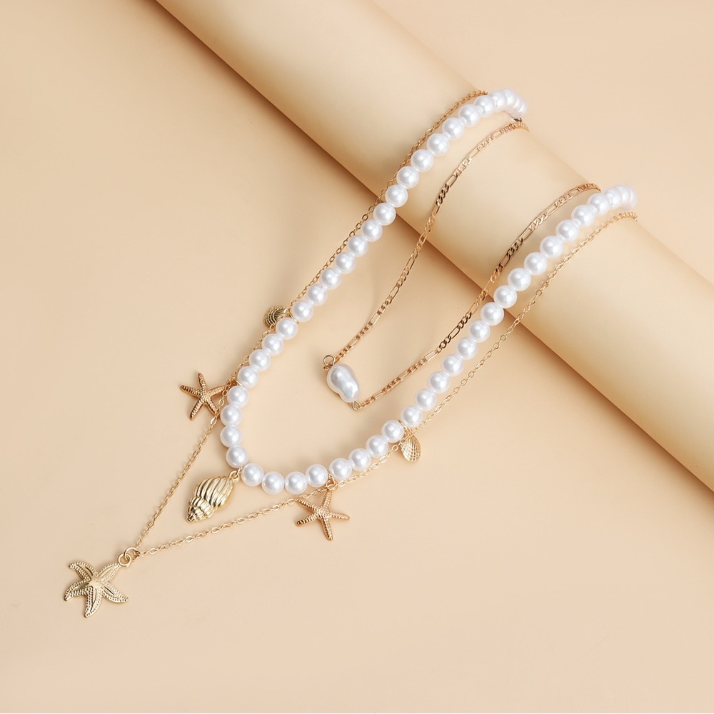 Elegant Gold and Pearl Starfish Necklace